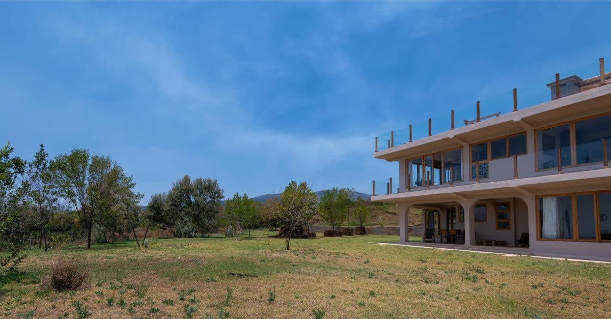 La Maison Bleue Naivasha — house set into the hillside garden