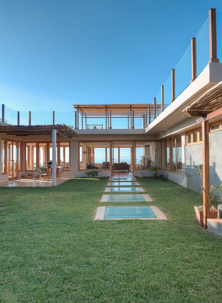La Maison Bleue Naivasha — central courtyard lawn with glass skylight panels