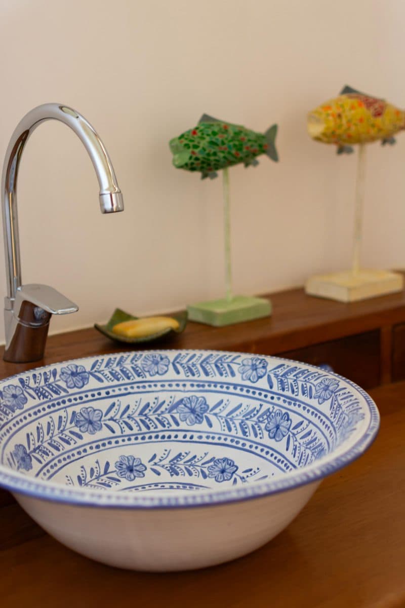 La Maison Bleue Naivasha — close-up of patterned ceramic basin and chrome faucet