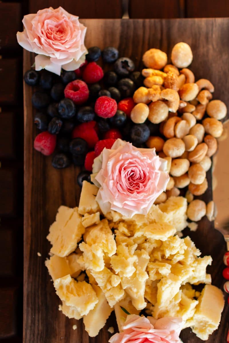 La Maison Bleue Naivasha — cheese, berries and nuts arranged with pink roses