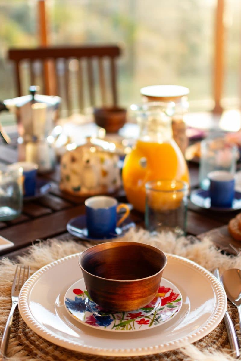 La Maison Bleue Naivasha — wooden cheese board with berries and a pink rose