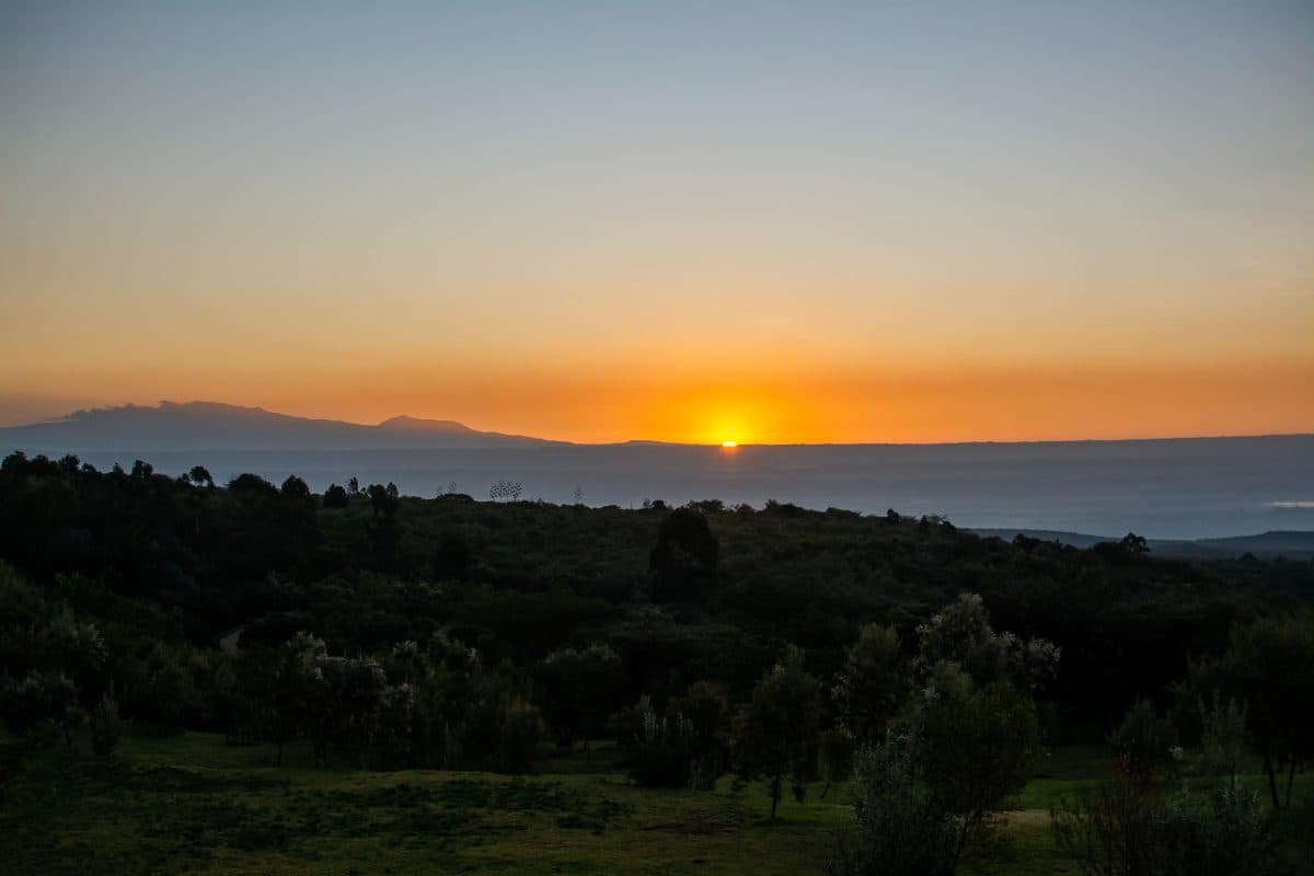 La Maison Bleue Naivasha — sunset over mountains and green valley