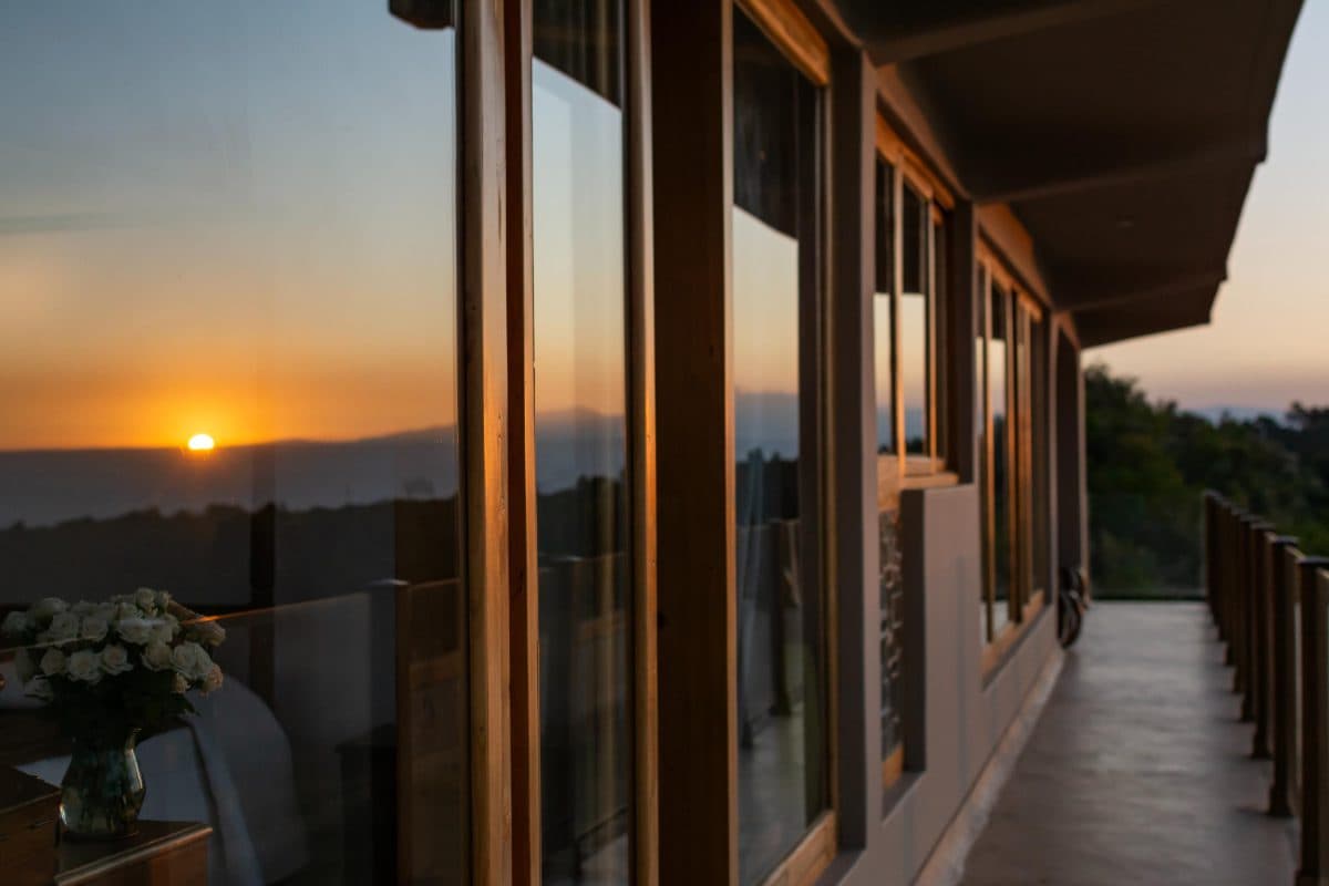 La Maison Bleue Naivasha — sunset reflection in the balcony glass railing