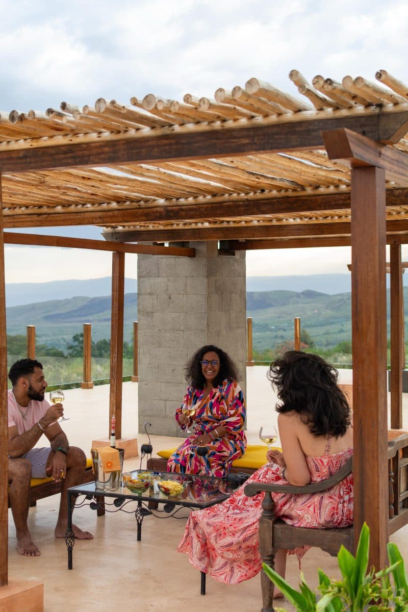 La Maison Bleue Naivasha — guests relaxing under the wooden pergola