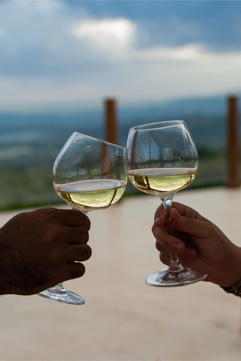 La Maison Bleue Naivasha — toast with white wine glasses on the terrace